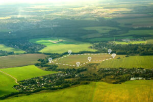 Photo showing a vacant piece of land on sale with boundaries.